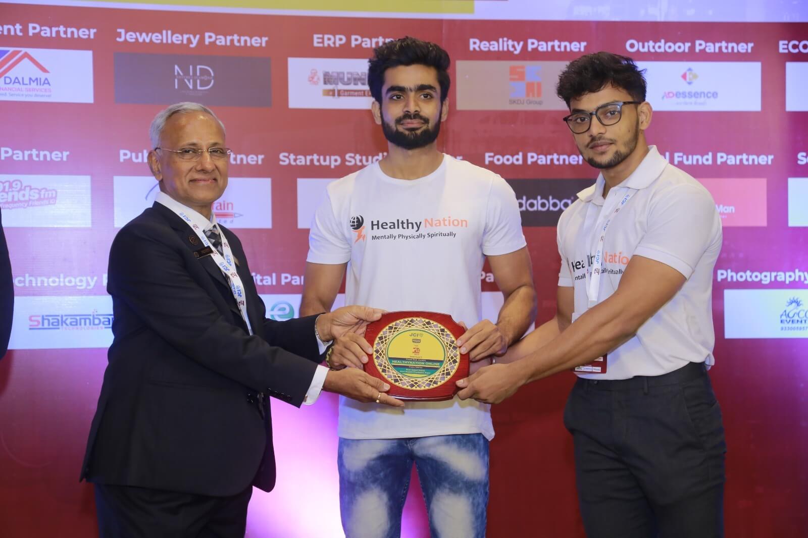 Receiving industry recognition on stage